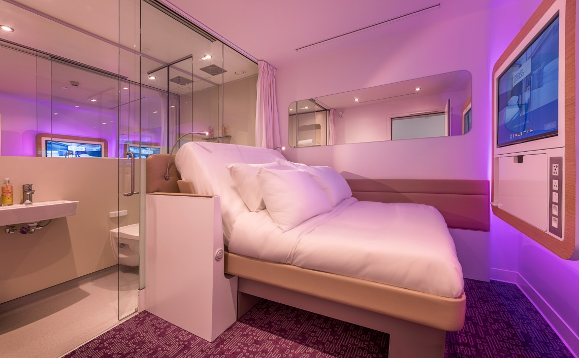 A guest room in YOTELAIR Singapore Changi Airport